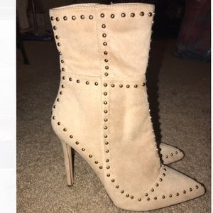 Nude stiletto ankle booties with studs